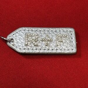 Rodan & Fields Silver Bag Charm With Crystal Embellishments